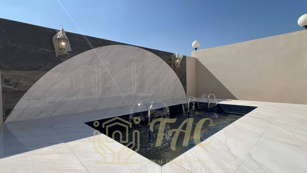 villa in the Mushrif area with a European design in a prime location, directly overlooking the main street, consisting of 6 master bedrooms. - Image 35