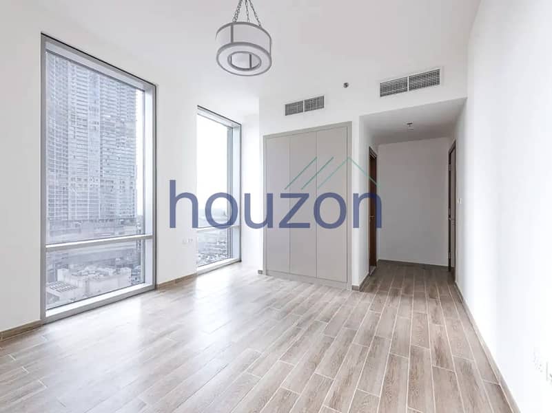 Canal View 2BR | Spacious Layout | High Floor