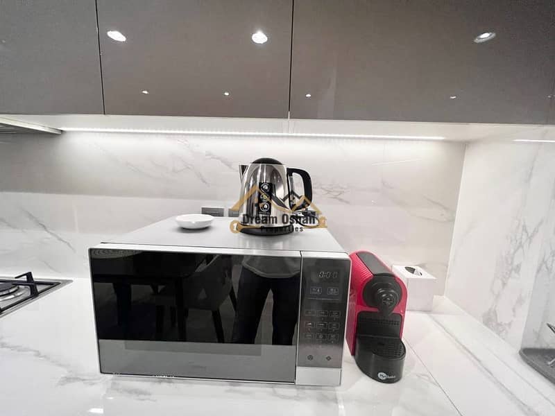 LUXURY FURNISHED BURJ VIEW 1BHK READY TO MIVE - Image 8