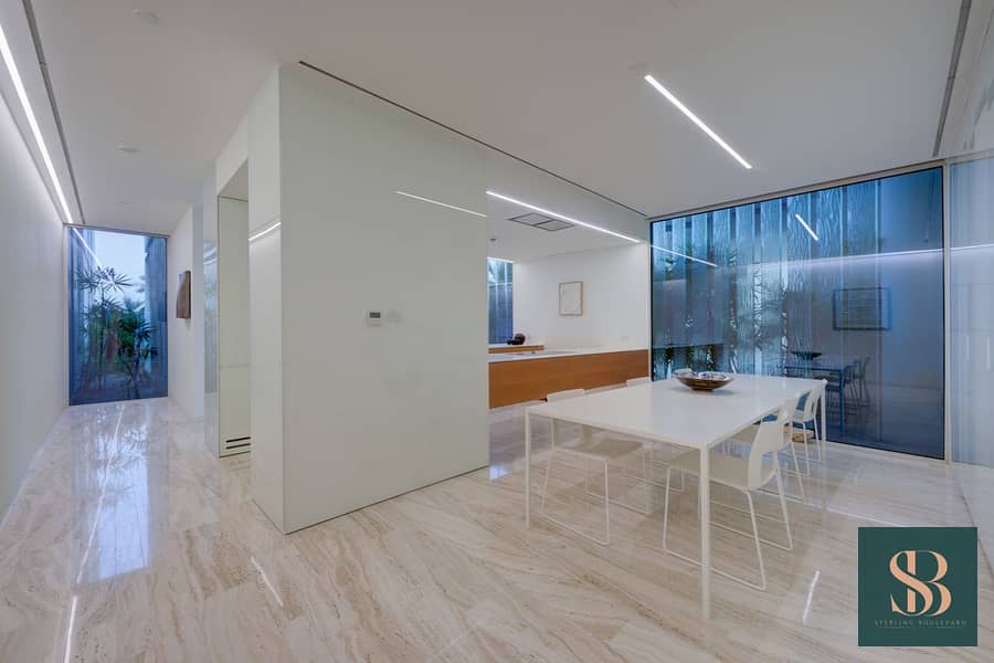 Designer Living on the Palm | Rare Garden Unit