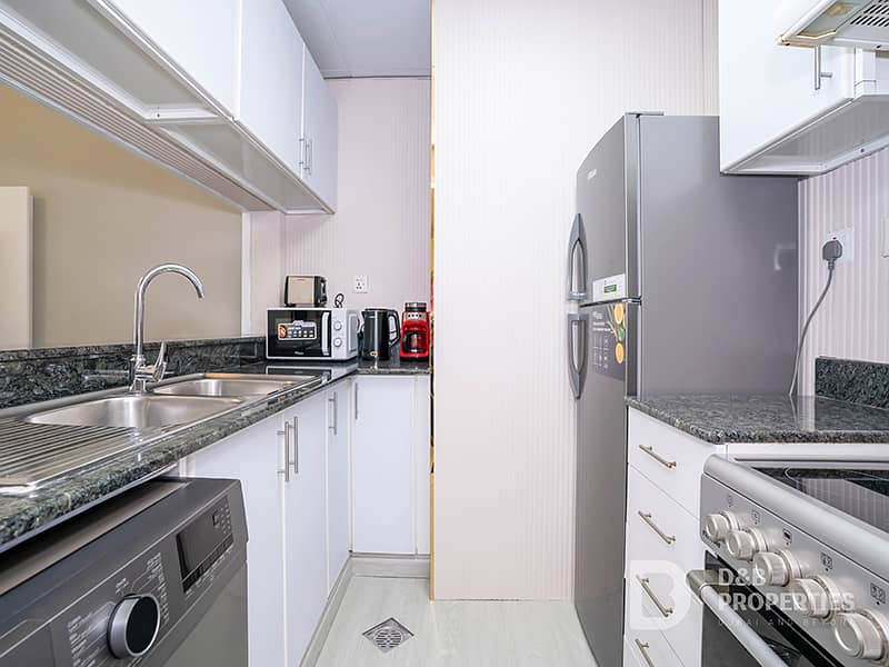 Furnished | Upgraded | Near Metro | Spacious 1BHK - Image 8