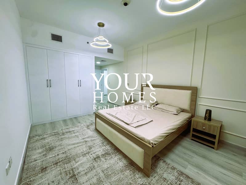 Fully Furnished | Upgraded 2BR + Maids Room | 6/12 Cheques