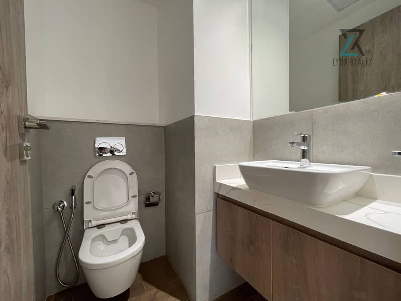 "Exquisite 1-Bedroom Apartment: Luxury Living in Nad al Hammar" - Image 9