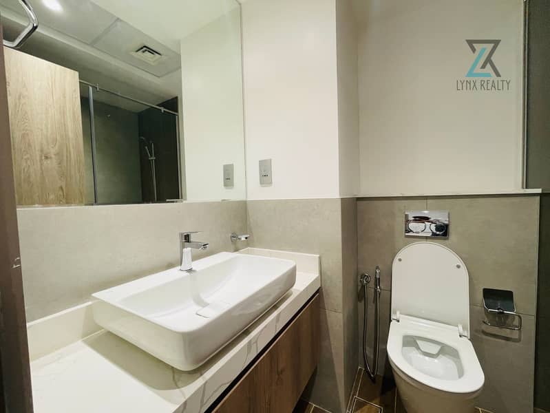 "Exquisite 1-Bedroom Apartment: Luxury Living in Nad al Hammar" - Image 12