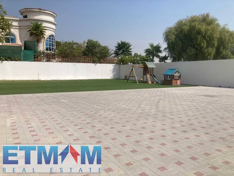5BR Villa with Majlis & Private Garden | Nad Al Sheba 4