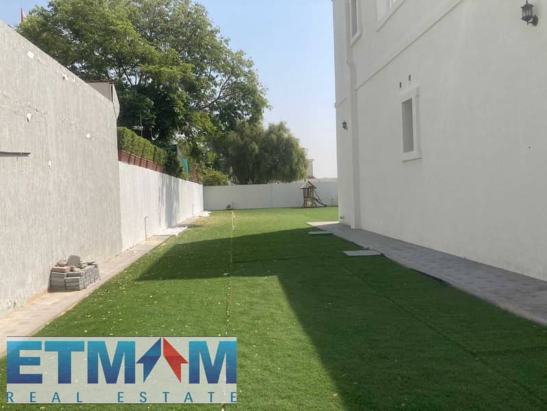 5BR Villa with Majlis & Private Garden | Nad Al Sheba 4