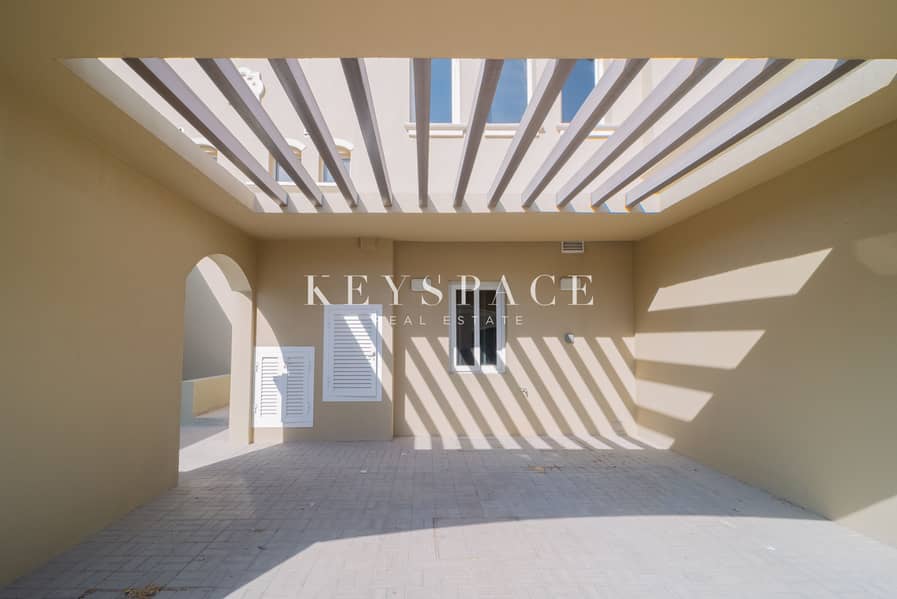 2BR VILLA + MAIDS ROOM l MIDDLE UNIT l LANDSCAPED l UNFURNISHED