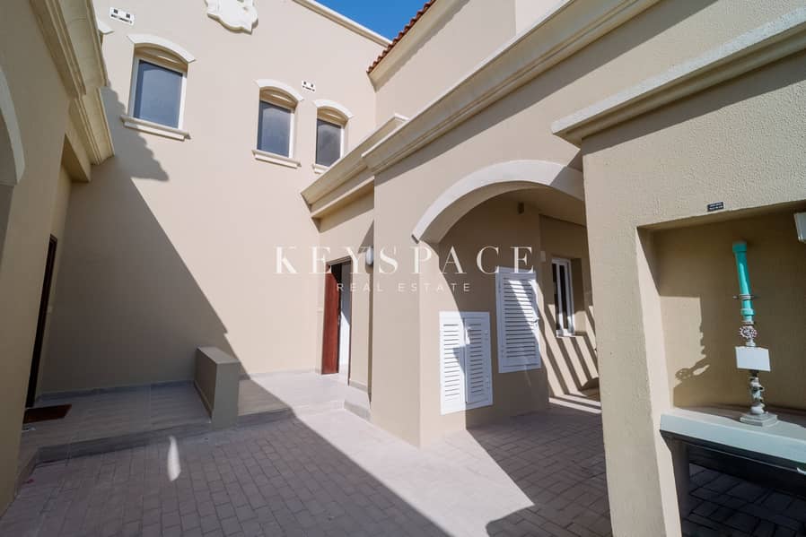 2BR VILLA + MAIDS ROOM l MIDDLE UNIT l LANDSCAPED l UNFURNISHED