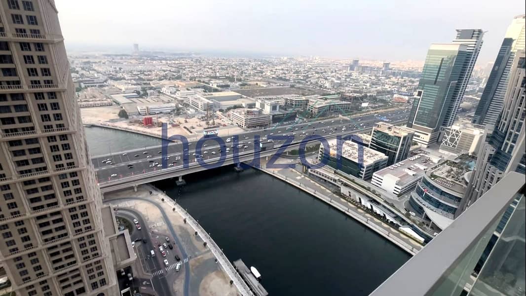 Elegant 2BR | Canal + Sea | Burj View