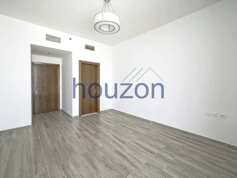Elegant 2BR | Canal + Sea | Burj View - Image 12