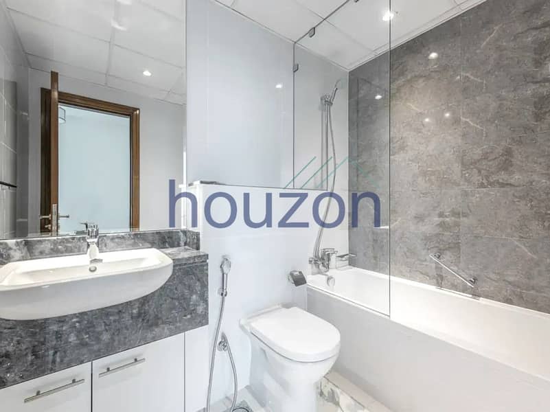 Elegant 2BR | Canal + Sea | Burj View - Image 13