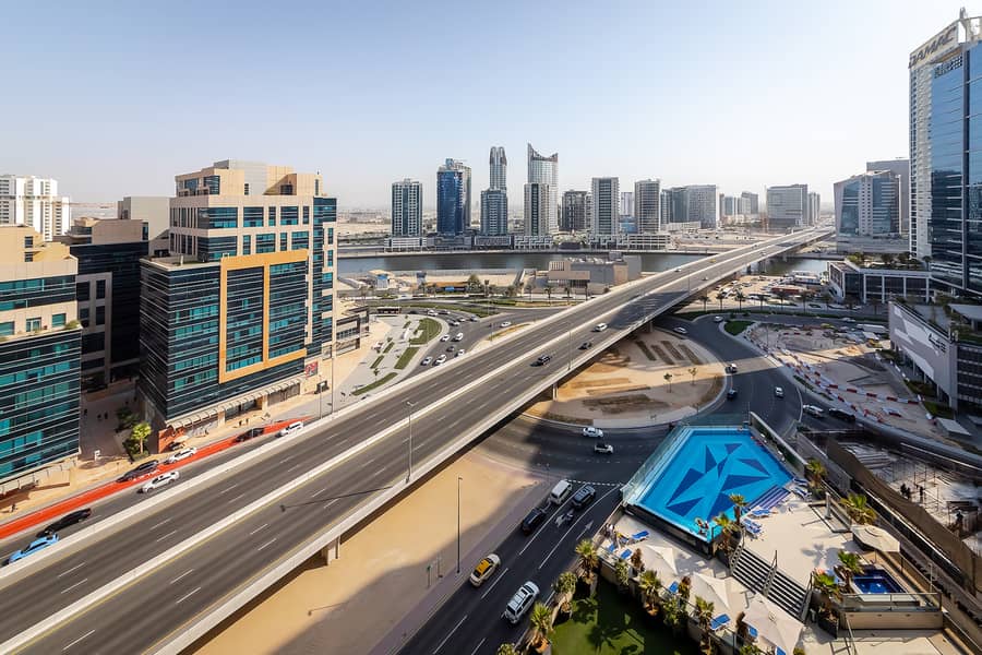 Stylish 1BR Apartment with Canal View | Elite Downtown Residence - Image 12