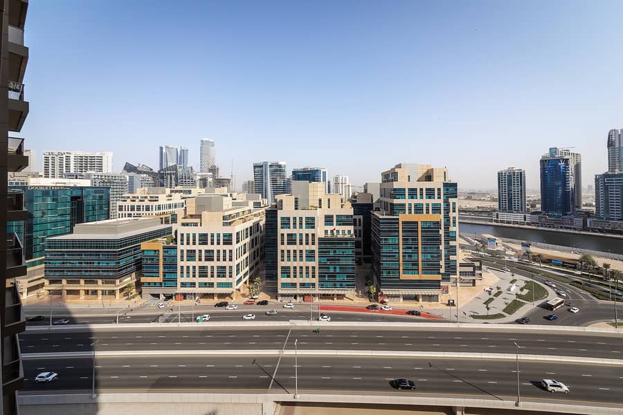 Stylish 1BR Apartment with Canal View | Elite Downtown Residence - Image 13