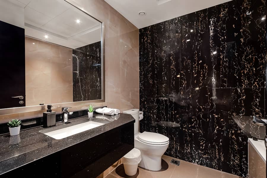 Stylish 1BR Apartment with Canal View | Elite Downtown Residence