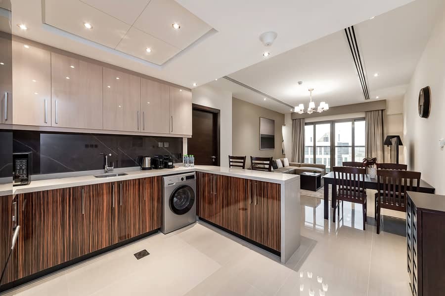 Stylish 1BR Apartment with Canal View | Elite Downtown Residence - Image 9