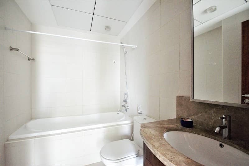 BRIGHT AND SPACIOUS 1 BED | PARTIAL FOUNTAIN VIEW - Image 13