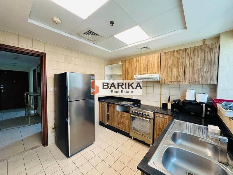 Elegant 2BR Fully Furnished |Al Noujoum Tower - Image 12