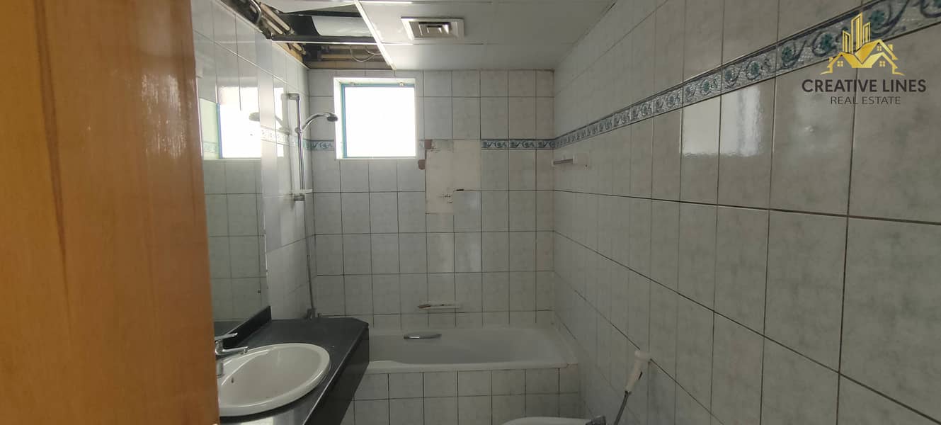 Hot Deal | Spacious 2BHK in Saeed Tower 1 | Chiller Free | Prime SZR Location - Image 11