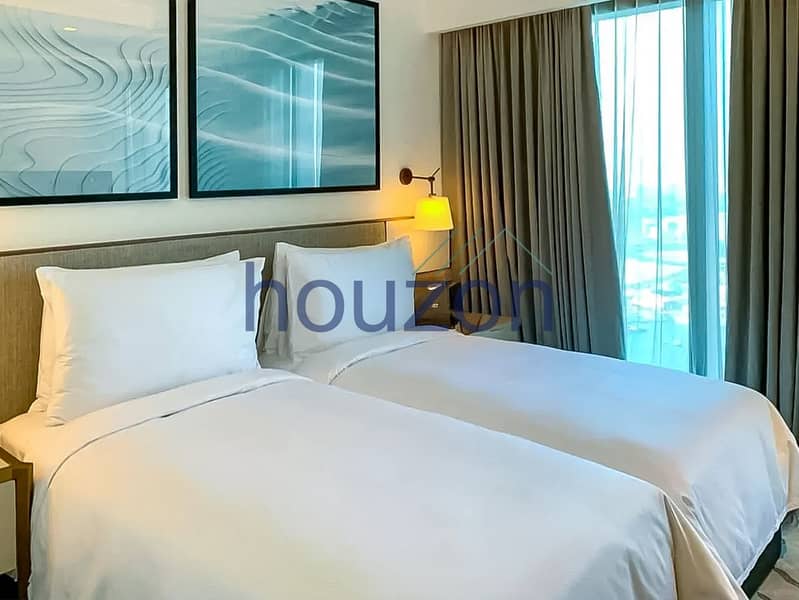 Spacious 2BR | High Floor | Sea + Burj View - Image 7