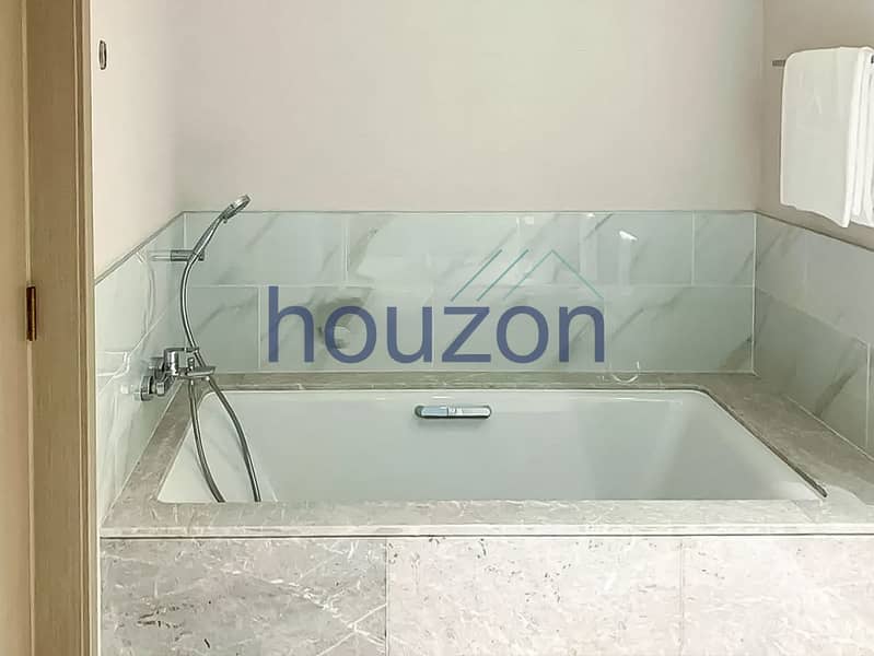 Spacious 2BR | High Floor | Sea + Burj View - Image 11