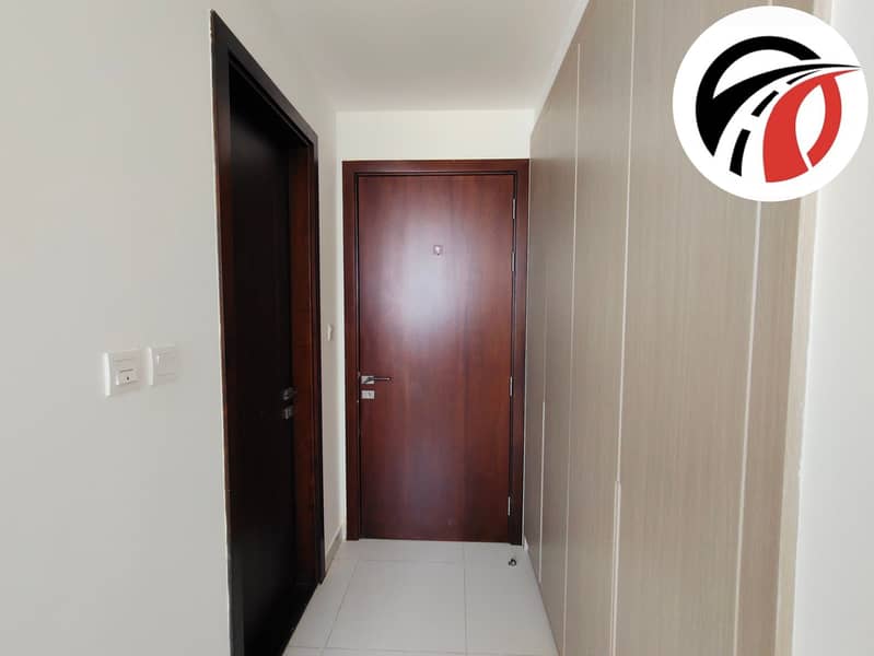 Spacious 2 bhk apartment/ closed kitchen/ spacious layout/ pool side view/ Arjan - Image 8