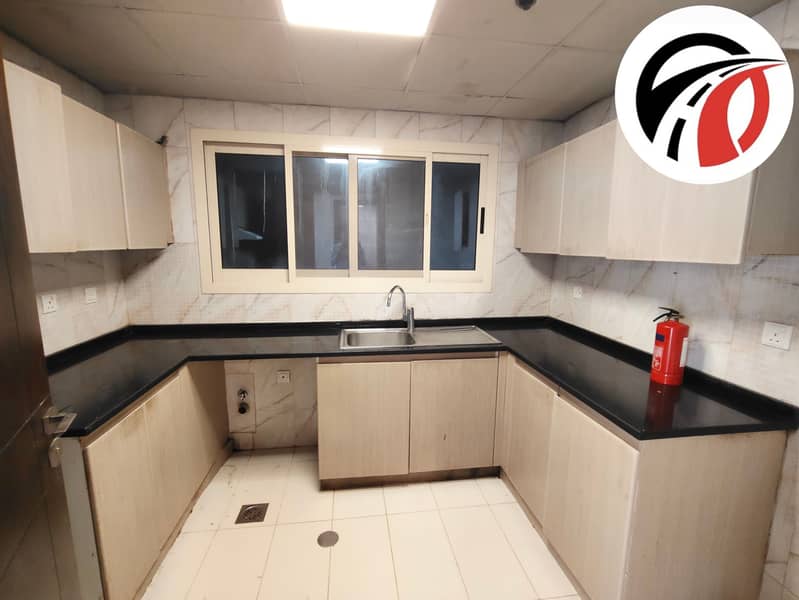 Spacious 2 bhk apartment/ closed kitchen/ spacious layout/ pool side view/ Arjan - Image 10