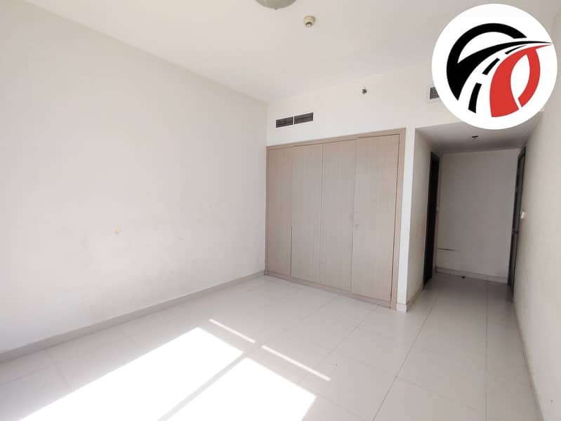 Spacious 2 bhk apartment/ closed kitchen/ spacious layout/ pool side view/ Arjan - Image 13