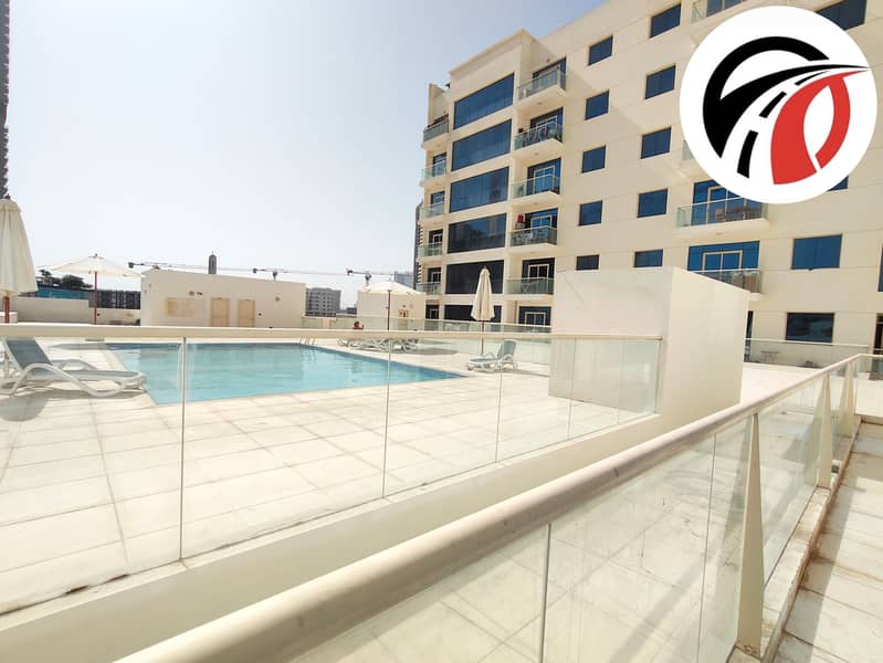 Spacious 2 bhk apartment/ closed kitchen/ spacious layout/ pool side view/ Arjan - Image 18