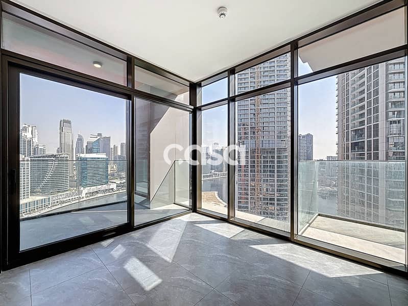 Burj and Canal view | High Floor | Corner Unit