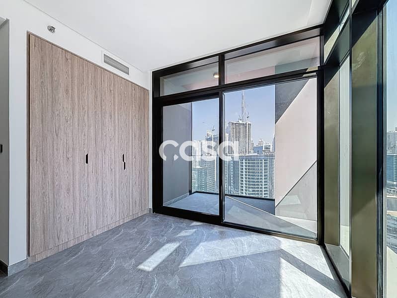 Burj and Canal view | High Floor | Corner Unit