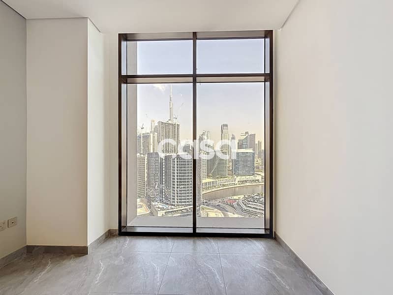 Burj and Canal view | High Floor | Corner Unit
