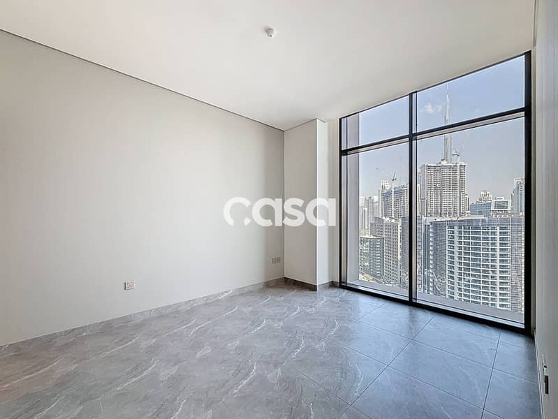 Burj and Canal view | High Floor | Corner Unit