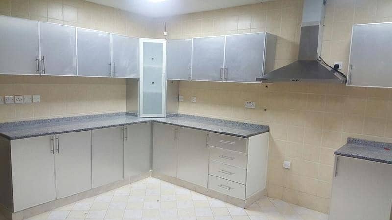 AN EXCELLENT 3 BED ROOM HALL 90K WITH PRIVATE BACK YARD AT MOHAMMED BIN ZAYED CITY