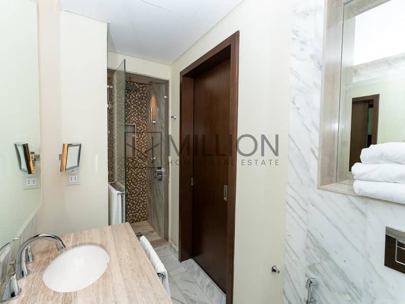 Luxury 4BR Apartment with Burj Khalifa View - Image 8