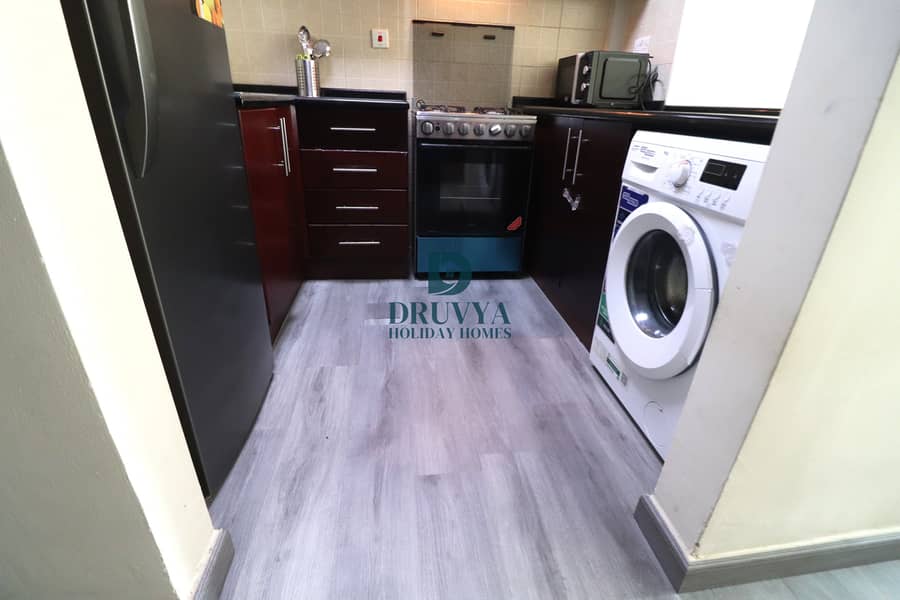 Fully Furnished Studio with Balcony Near Metro Station Monthly AED 7500/- - Image 12