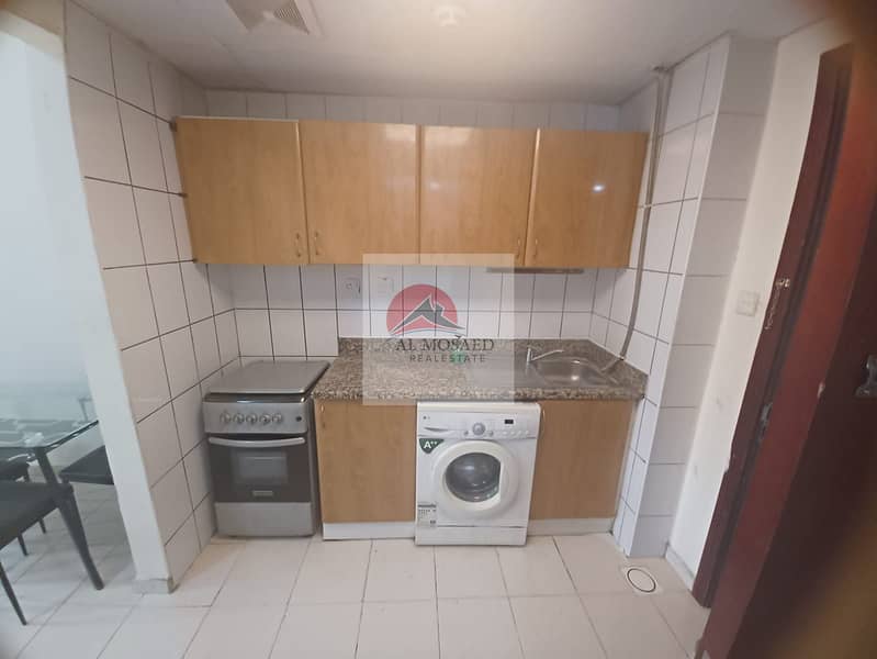 Fully furnished studio with balcony China cluster family building near children Park