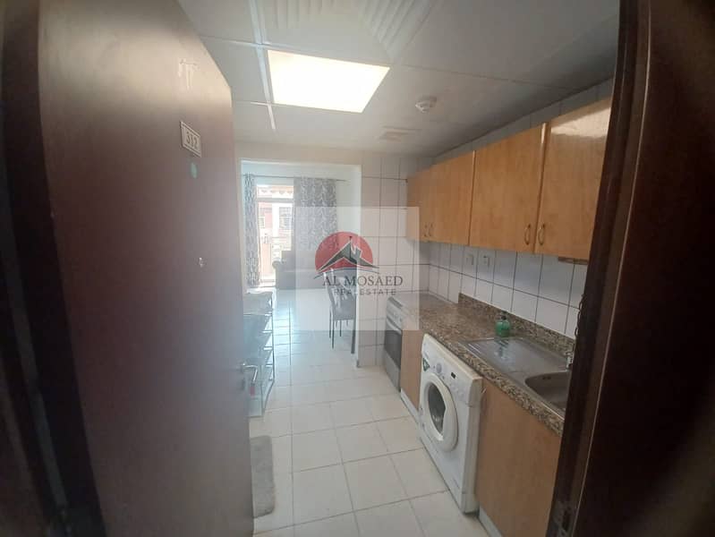 Fully furnished studio with balcony China cluster family building near children Park