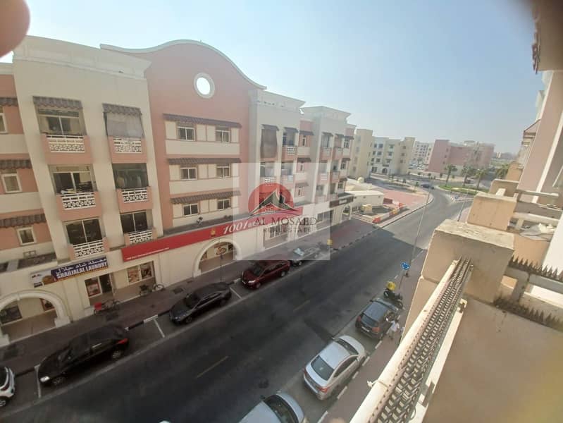 Fully furnished studio with balcony China cluster family building near children Park