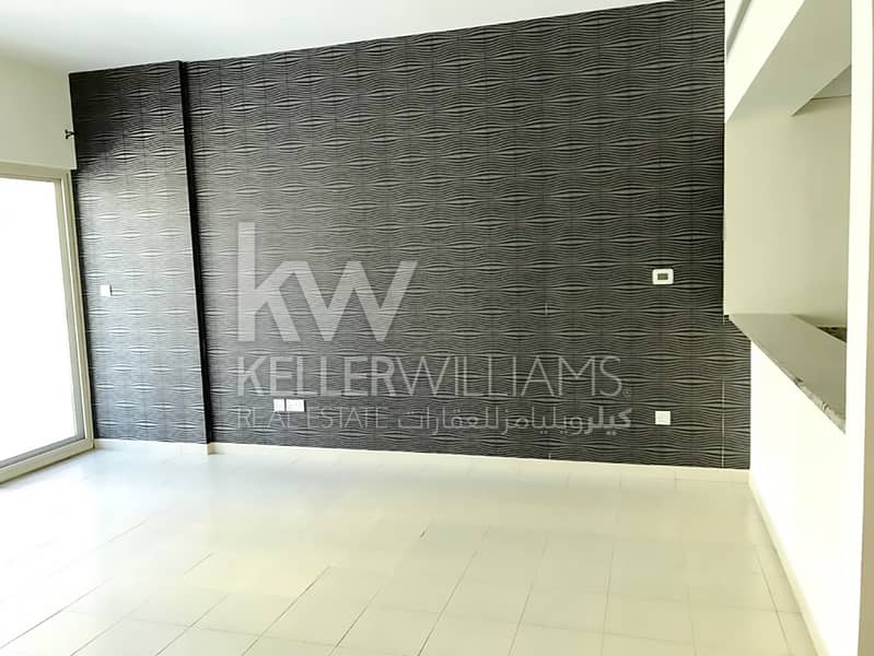 Lovely One BR with Balcony at AlGhozlan Greens