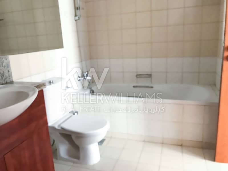 Lovely One BR with Balcony at AlGhozlan Greens - Image 9