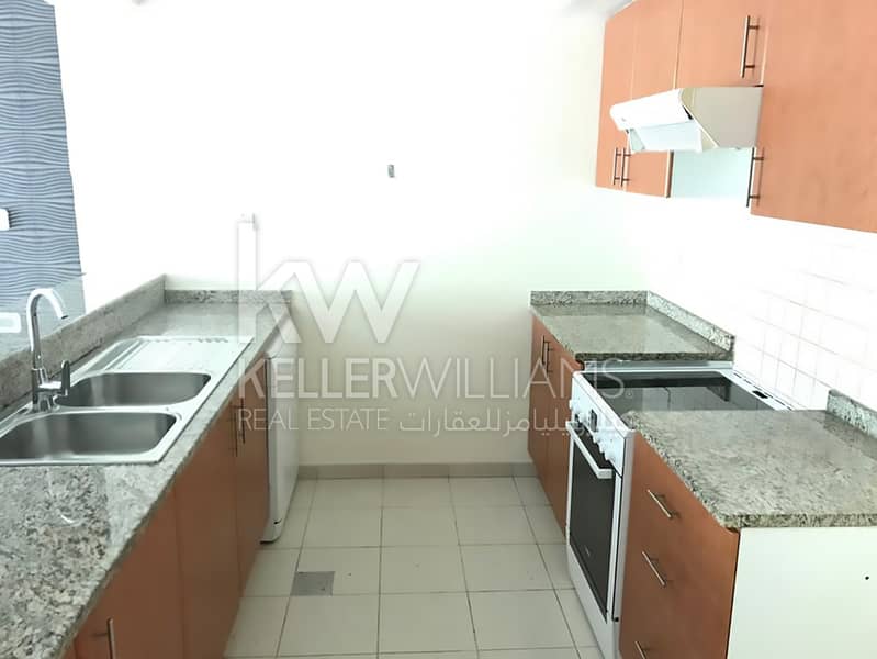 Lovely One BR with Balcony at AlGhozlan Greens - Image 10