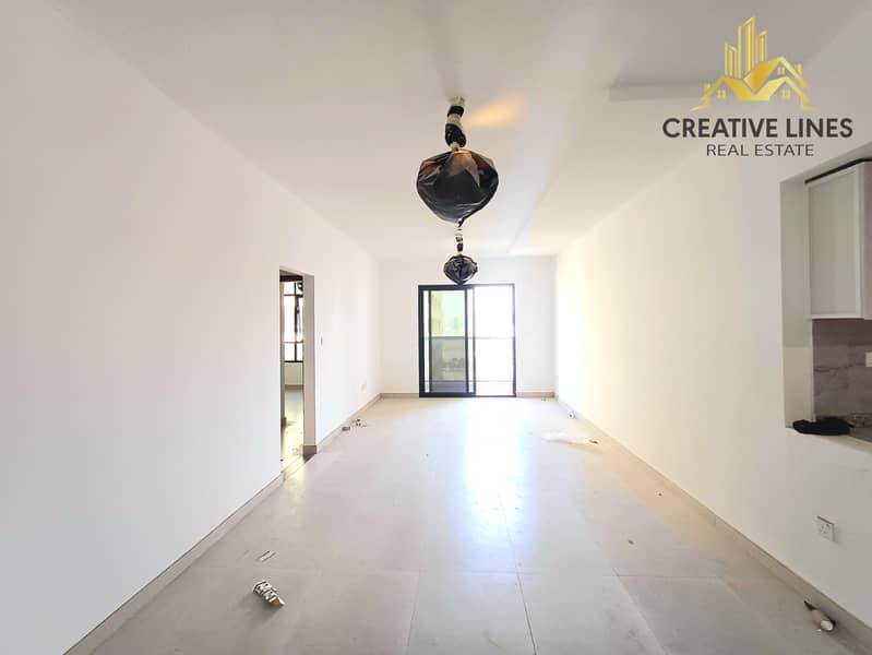 “Spacious 2BHK | DEWA Free | Gym & Pool | Parking | Open Kitchen”