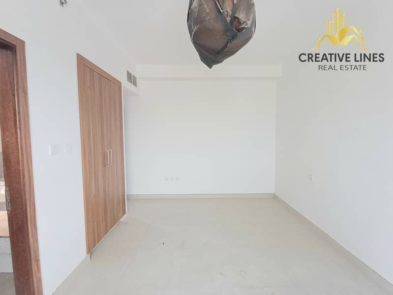 “Spacious 2BHK | DEWA Free | Gym & Pool | Parking | Open Kitchen”