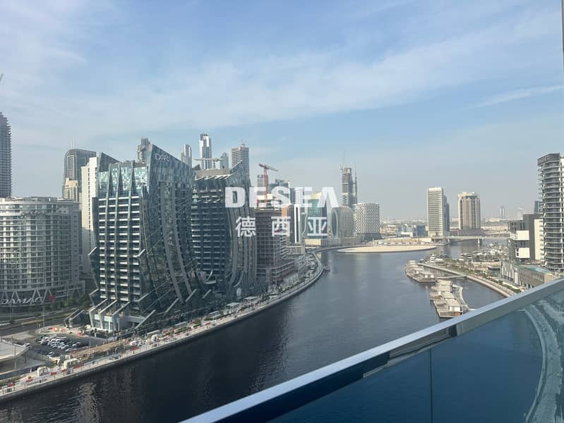 Vacant | Canal - Burj Khalifa View | Furnished - Image 10