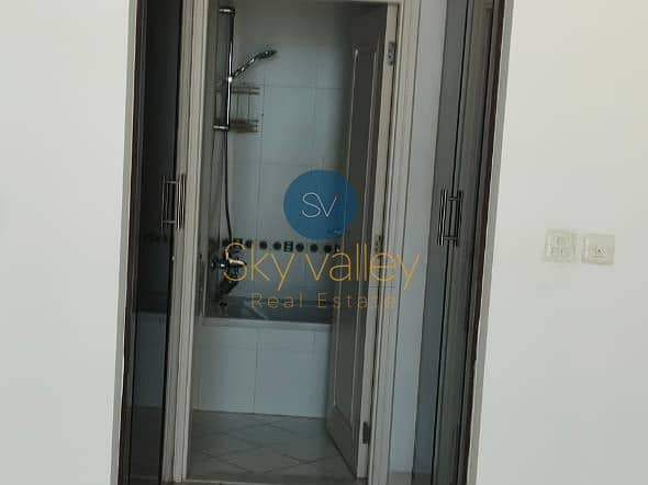 Spacious 2BR with Lake View | Maids Room | Vacant - Image 14