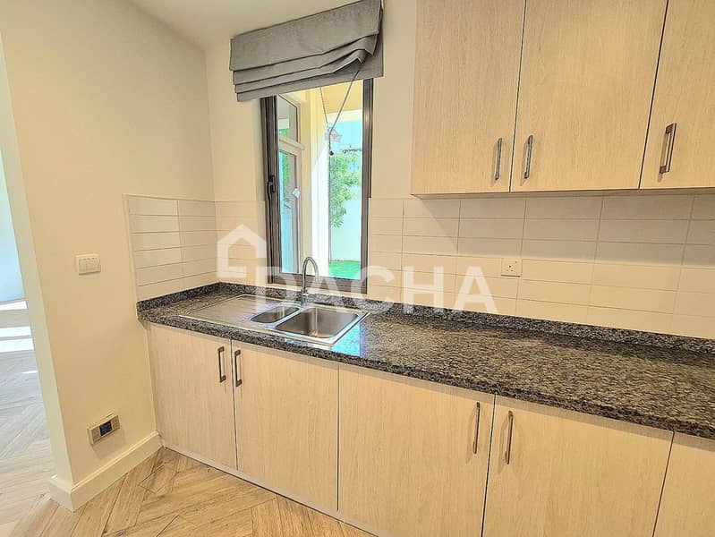 Upgraded | Next to Amenities | Landscaped garden