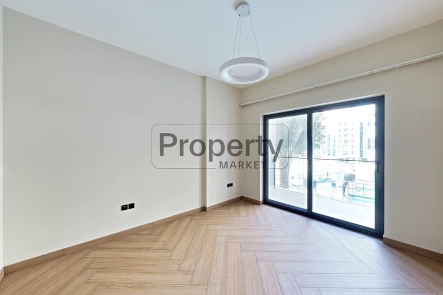 Vacant | Large Balcony | Pool View - Image 8