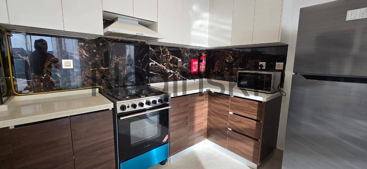 FULLY FURNISHED | WITH TENANT | MID FLOOR