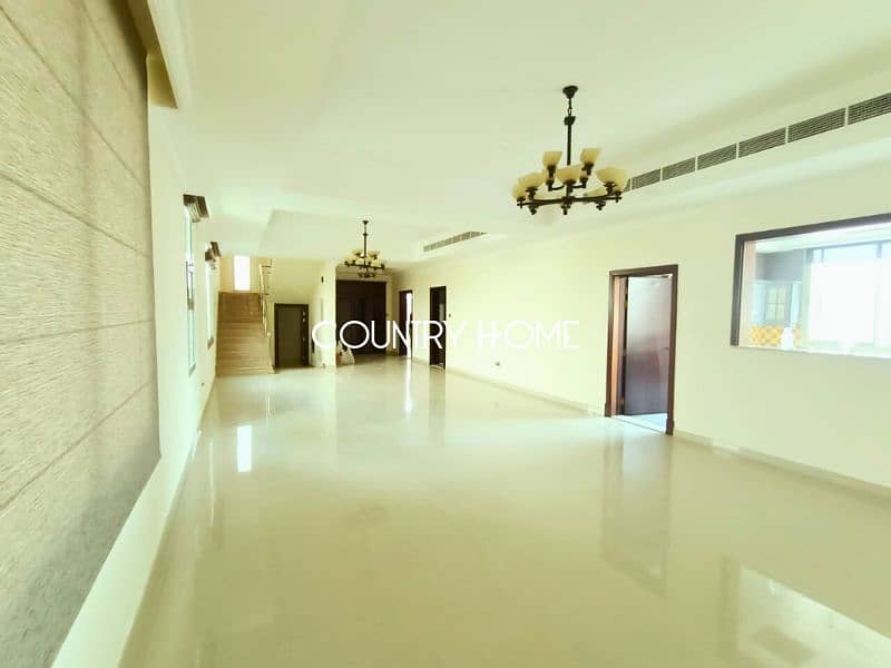 Spacious 5-BR Villa with Study, Private Garden & Close to SZR in Al Manara