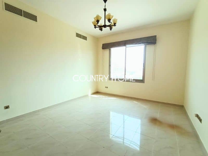Spacious 5-BR Villa with Study, Private Garden & Close to SZR in Al Manara